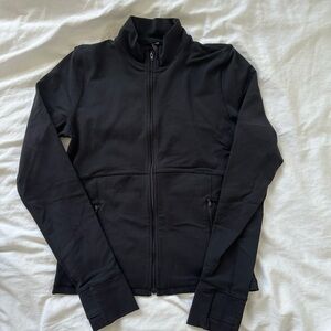 TNA action relay zip-up sweater